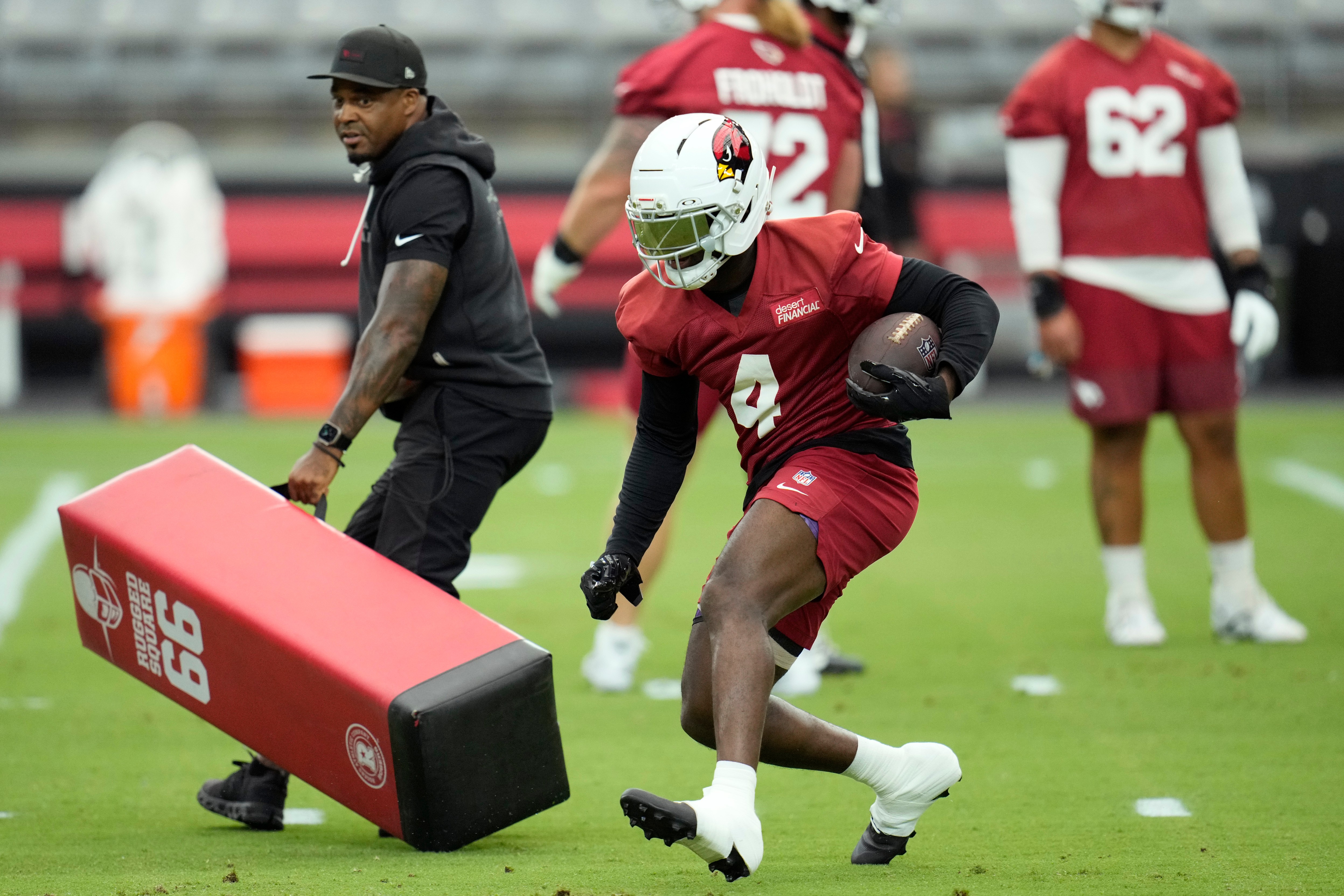 Arizona Cardinals running back Jeremiyah Love runs with the ball during NFL football training camp practice, July 23, 2026, in Glendale, Ariz. AP Photo/Ross D. Franklin
